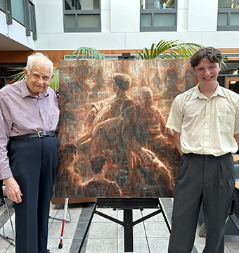 Photo of Dr. Eugene Jekel and artist (and grandchild) Tails Jekel