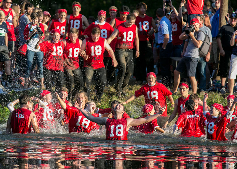 Hope students in red celebrating their win of the Pull in Black River
